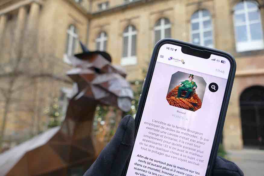 Ecran de jeu joueurs en equipe à Metz dans une aventure sur le thème de la magie de type Escape Game.